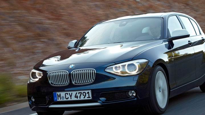 2012 BMW 1-Series Front Side Pose in Black